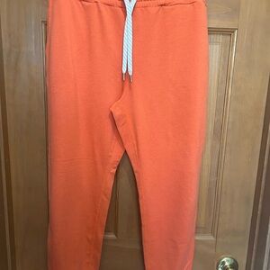 Vuori performance jogger. Medium. 25 inseam. Orange. Great condition.